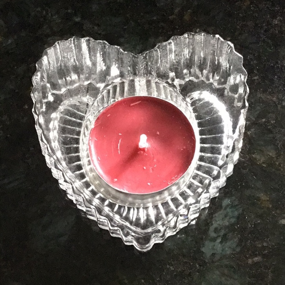 Lead crystal heart votive holder.
